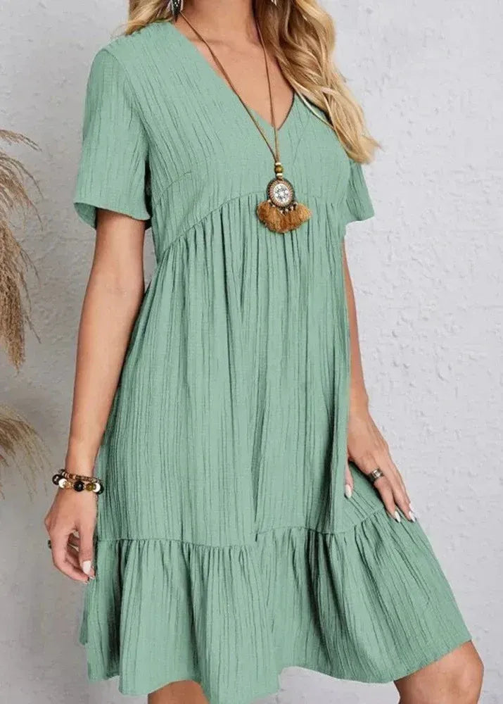 Claudia - Vestido elegante que disimula el vientre